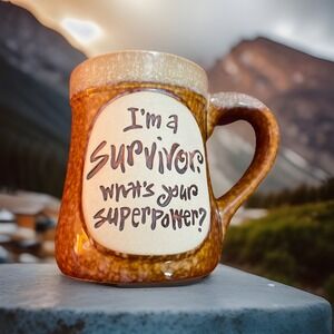JOANNE SHARPE "I'M A SURVIVOR. WHAT'S YOUR SUPERPOWER?" STONEWARE COFFEE CUP MUG